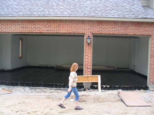 2004_06_20 002 Black Tar Sealer Aprayed over the Spancrete