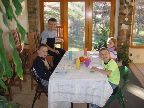 2005_12_06 051 Corte, Michael, Allison, and Daniel at the Kid's Table