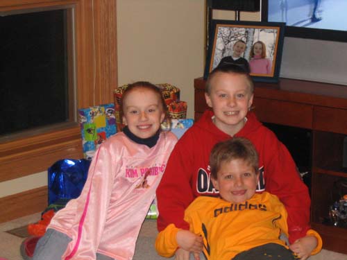 2005_02_05 021 Allison, Corte, and Mason in Front of the Presents